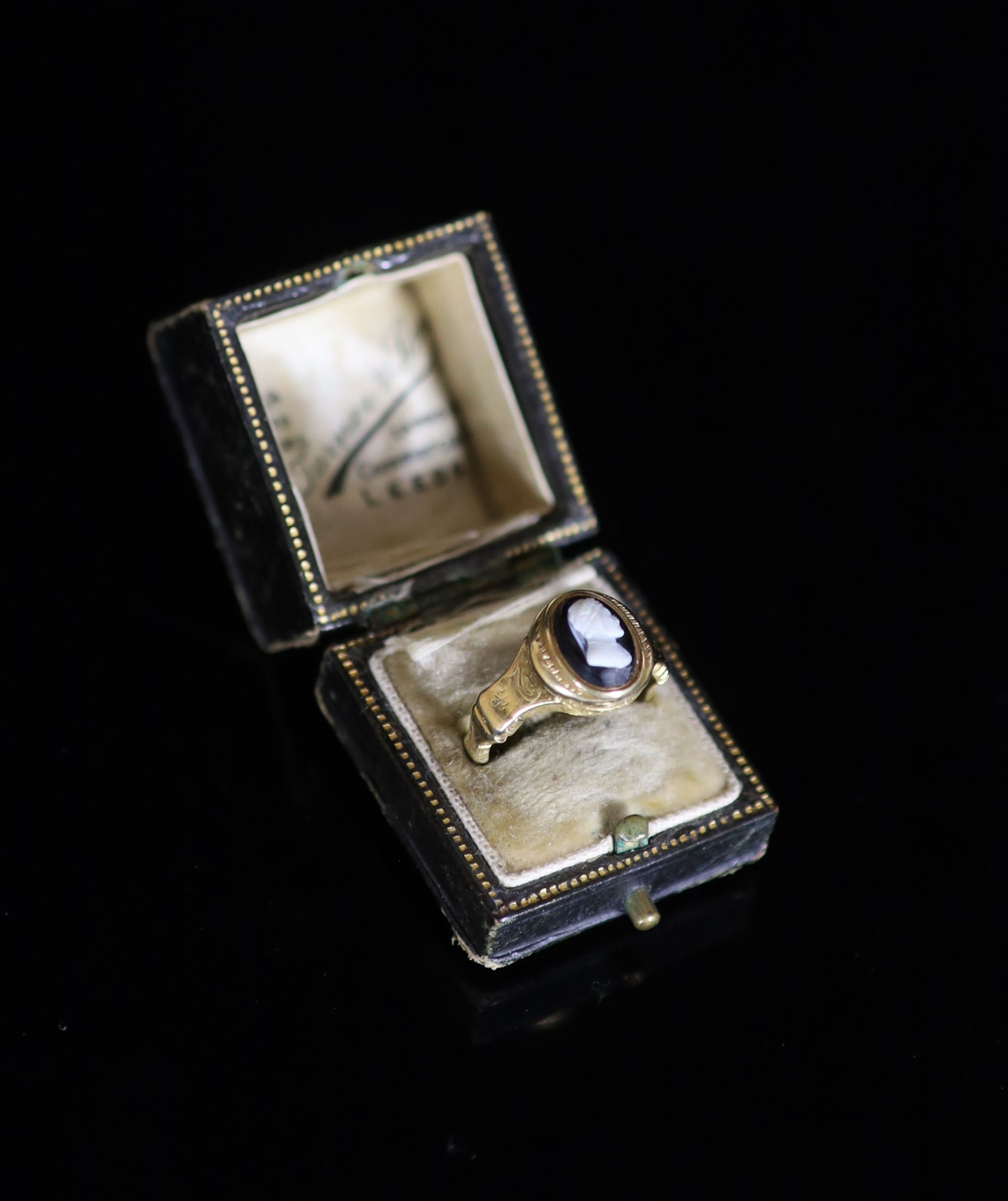 An early 19th century gold and cameo set poison ring